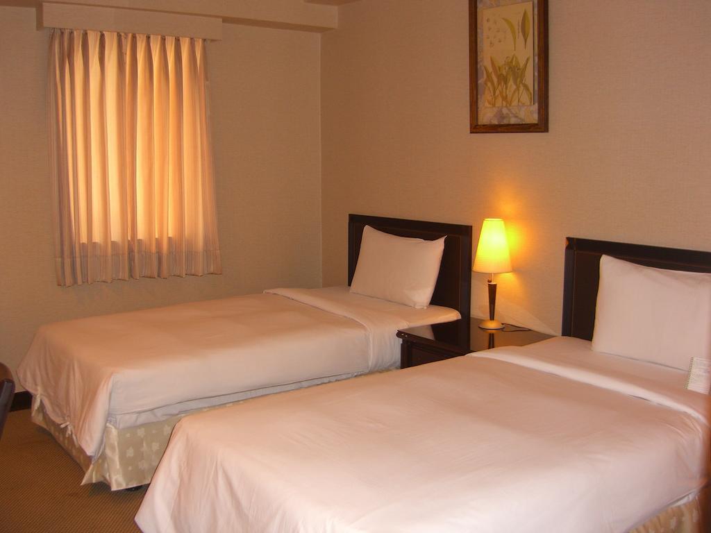 Lincoln Hotel Ταϊνάν Δωμάτιο φωτογραφία